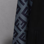 Black jacket sleeve detail with large FF logo pattern panel
