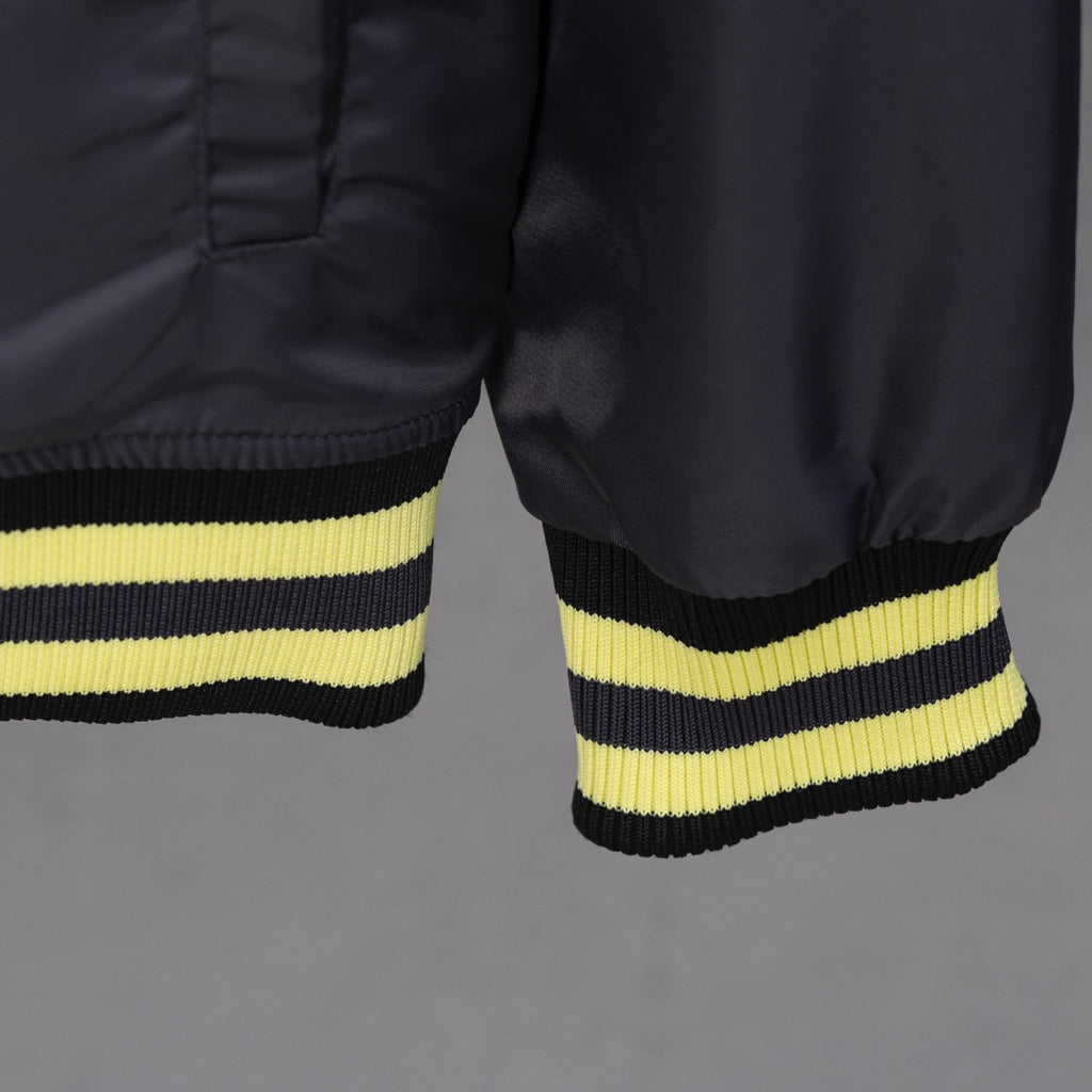 Louis Vuitton long bomber jacket hem and lower sleeves with yellow ribbed stripes
