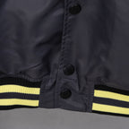 Louis Vuitton long bomber jacket cuff with dark snap buttons and yellow stripe