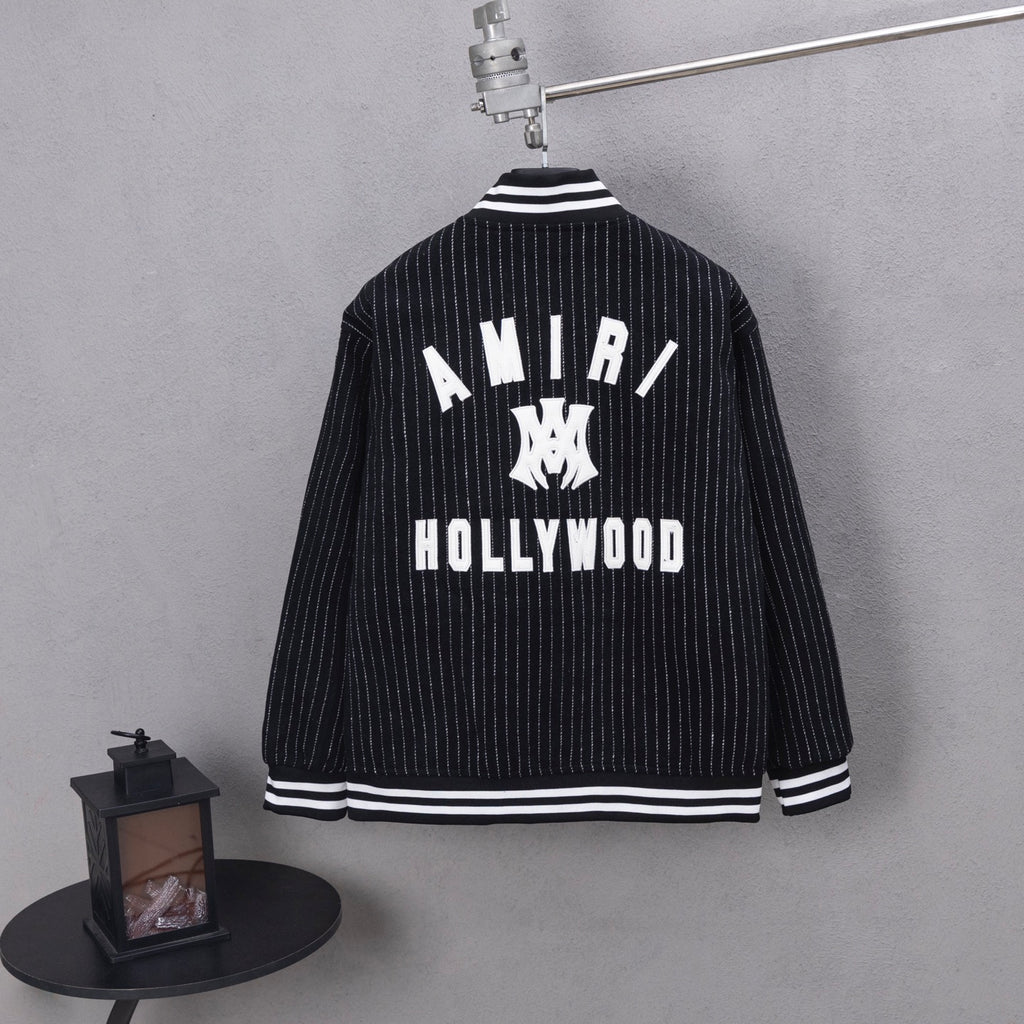 Pinstripe varsity jacket with AMIRI back graphic and striped cuffs