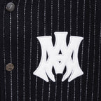White AMIRI logo patch on dark pinstripe varsity jacket