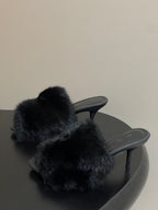 Black fuzzy slide sandals with open toe and high slim heel
