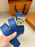 Louis Vuitton blue leather belt with gold-tone logo buckle and strap holes