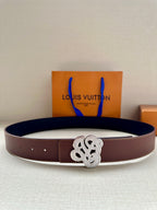 Louis Vuitton belt with dark brown leather strap and silver-tone logo buckle
