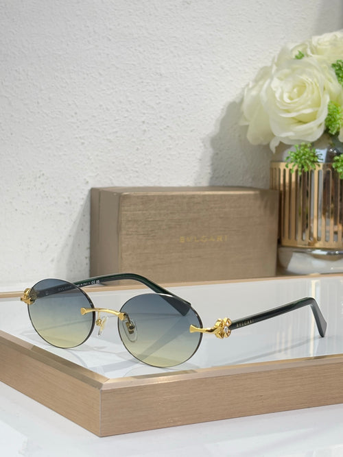Bvlgari round glasses with dark green frames, gold hardware, amber-tinted lenses