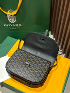 Goyard crossbody bag back view with textured black top and patterned front panel