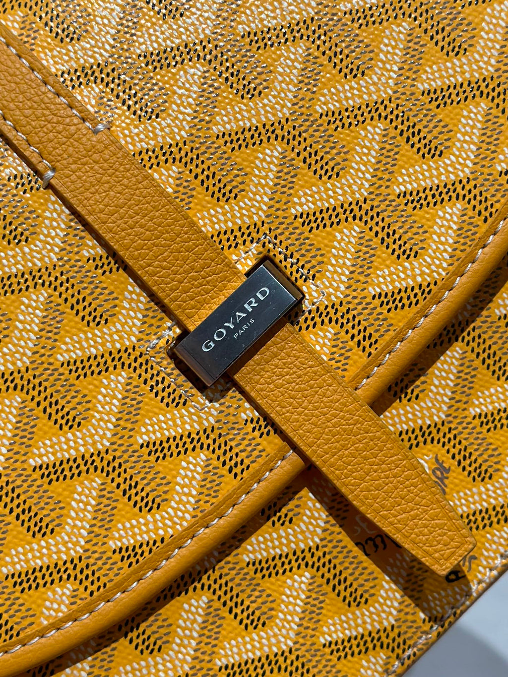 Goyard yellow jacquard monogram pouch with black logo patch and leather trim