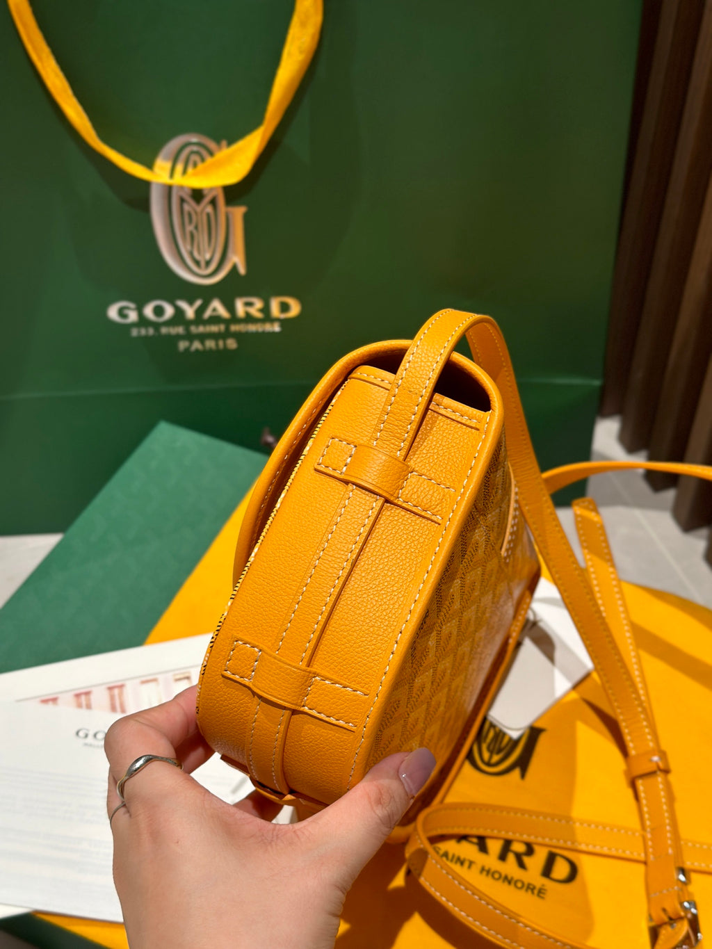 Goyard yellow leather mini bag with stitched trim and strap detail