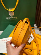 Goyard yellow leather mini bag with stitched trim and strap detail