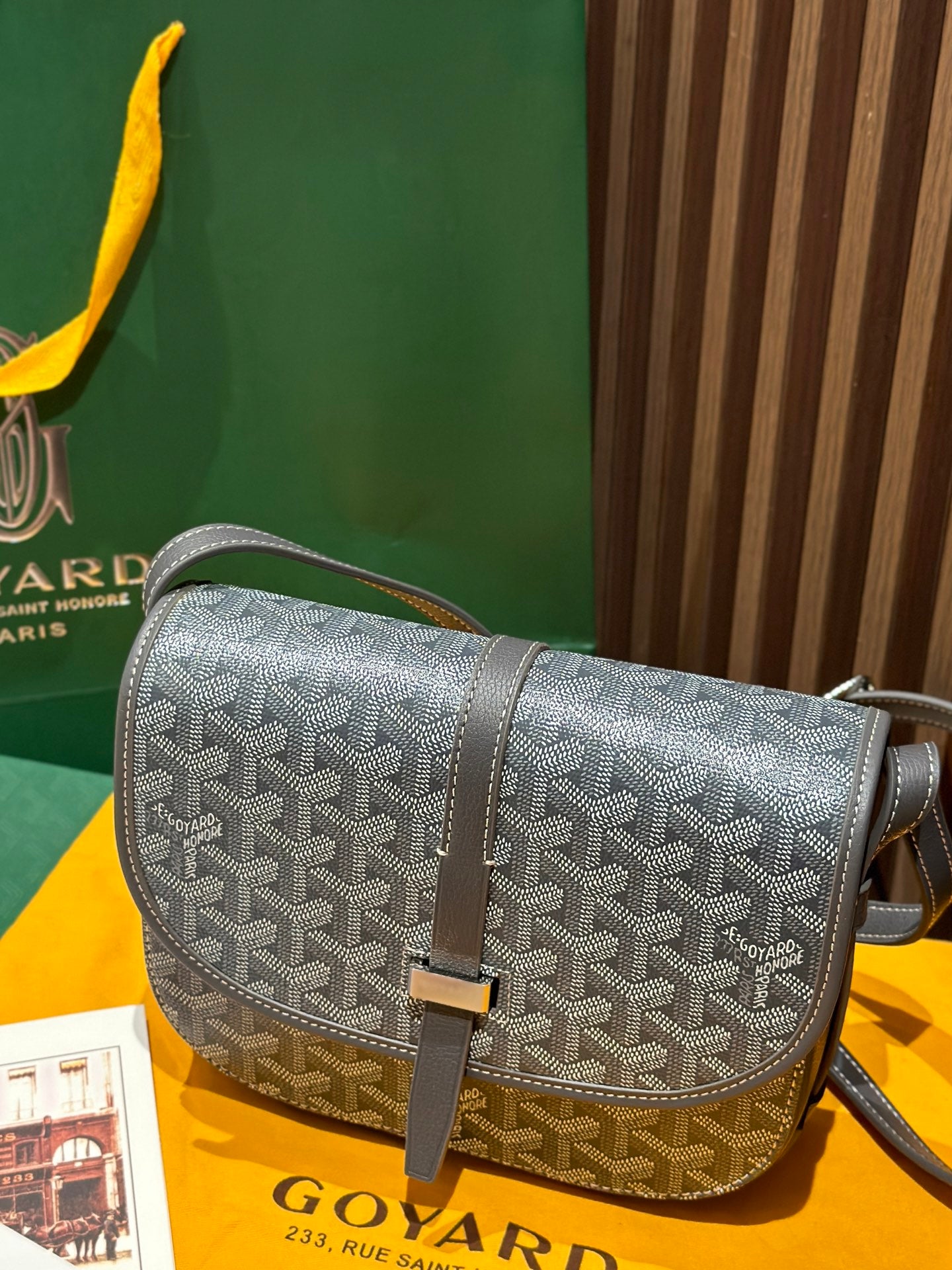 Goyard crossbody bag, monogram-style pattern with front flap and shoulder strap