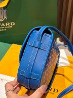 Goyard bag structured blue leather and monogram fabric with top handle and strap