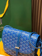 Goyard bag crossbody in blue with monogram fabric flap and adjustable shoulder strap