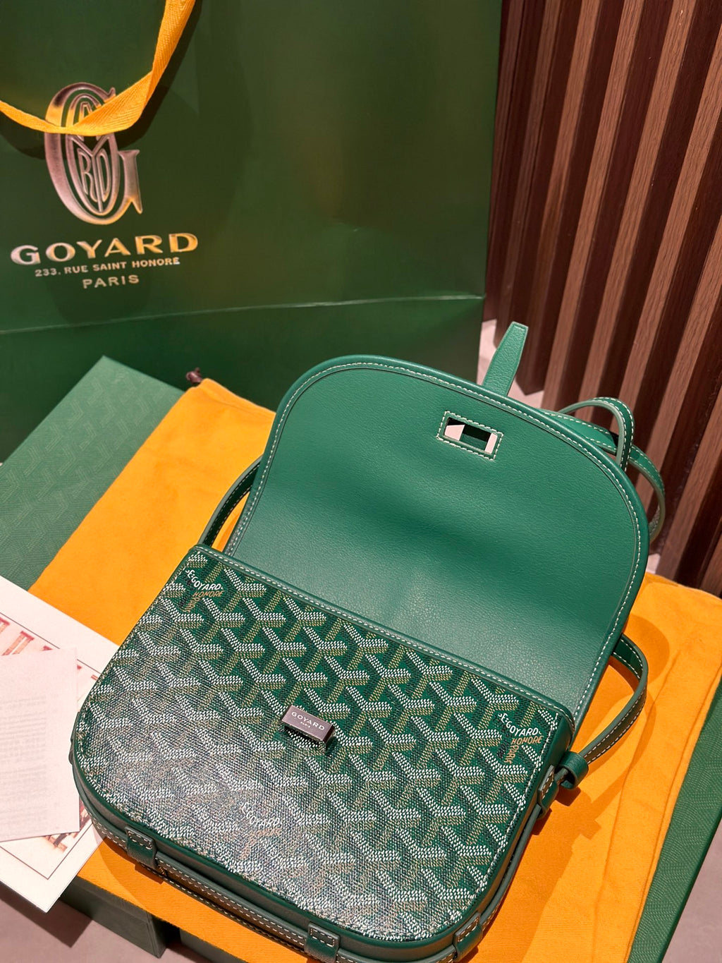 Goyard green leather crossbody bag with patterned flap and silver-tone clasp