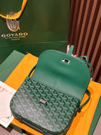 Goyard green leather crossbody bag with patterned flap and silver-tone clasp