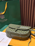 Olive Goyardine crossbody bag with patterned flap, front buckle clasp, and top handle.