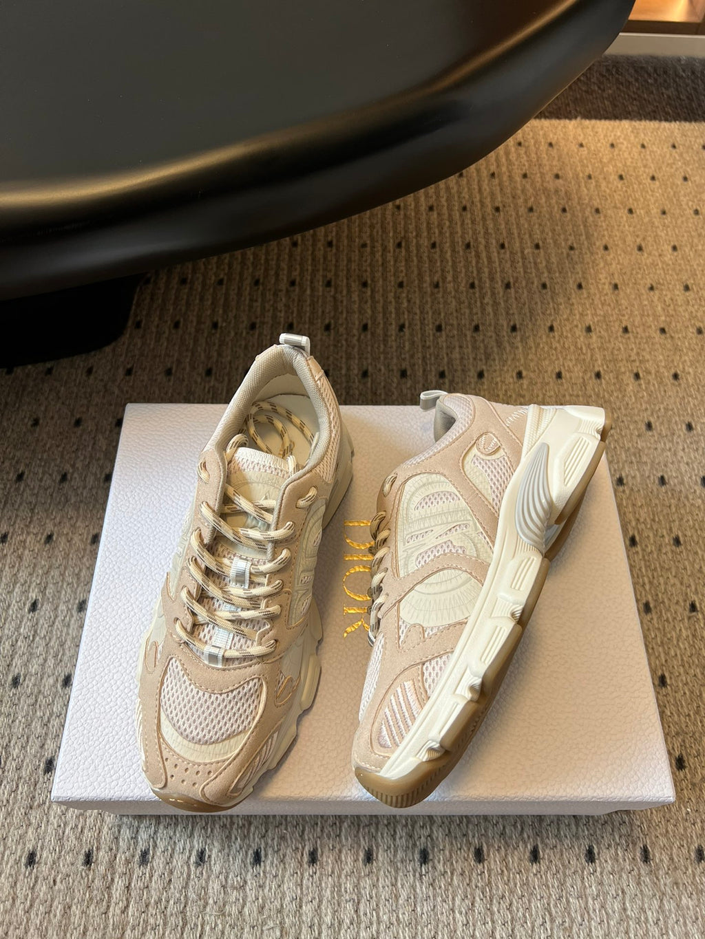 Dior unisex sneakers pair, cream with perforated panels and cushioned sole