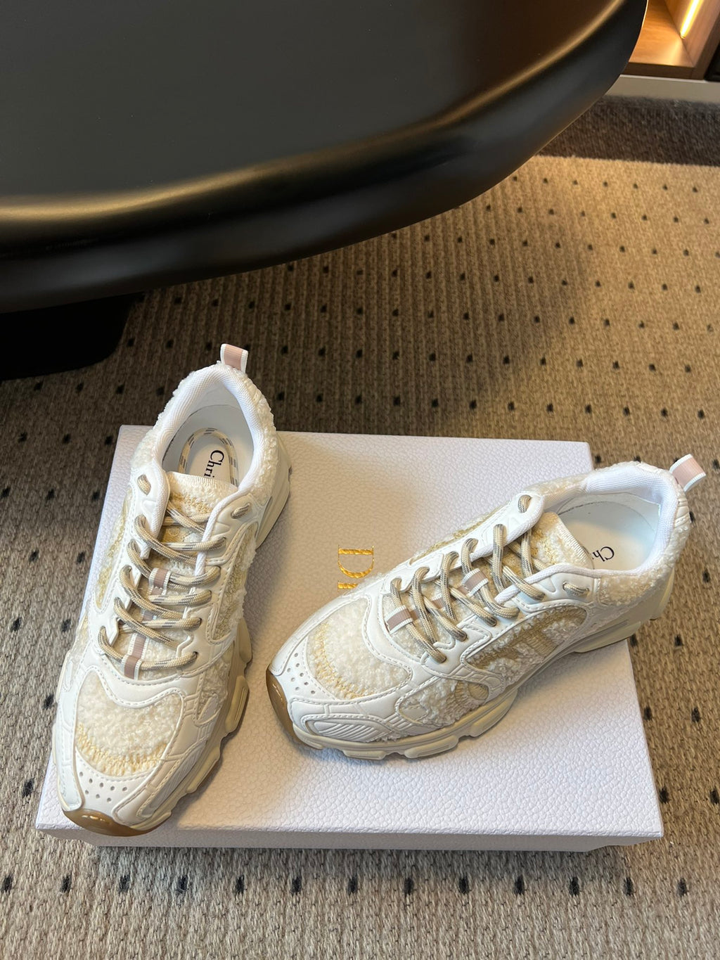 Dior unisex sneakers in white with gold speckle, lace-up pair on box