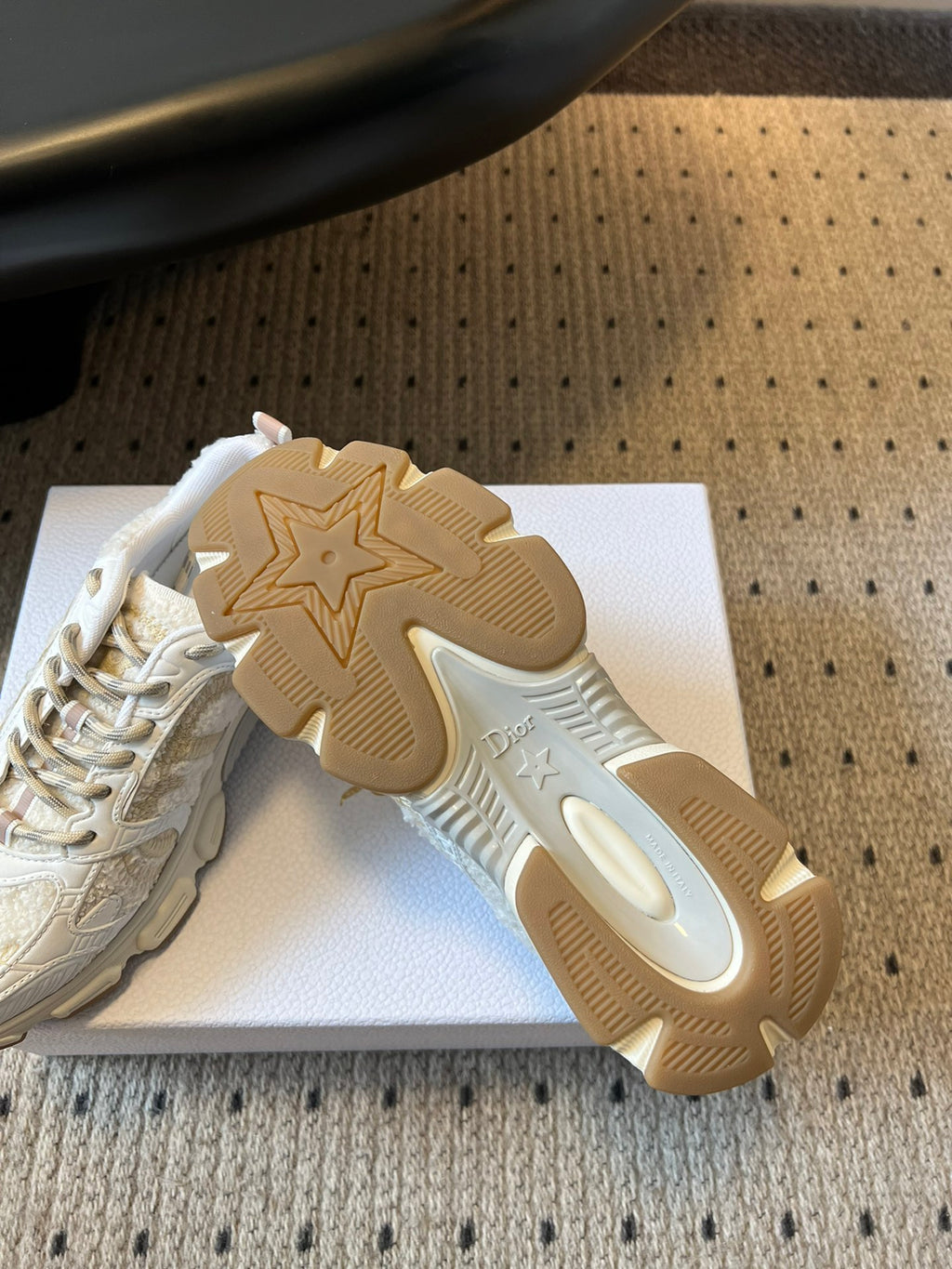 Dior unisex sneaker outsole, tan rubber sole with star grip and embossed Dior