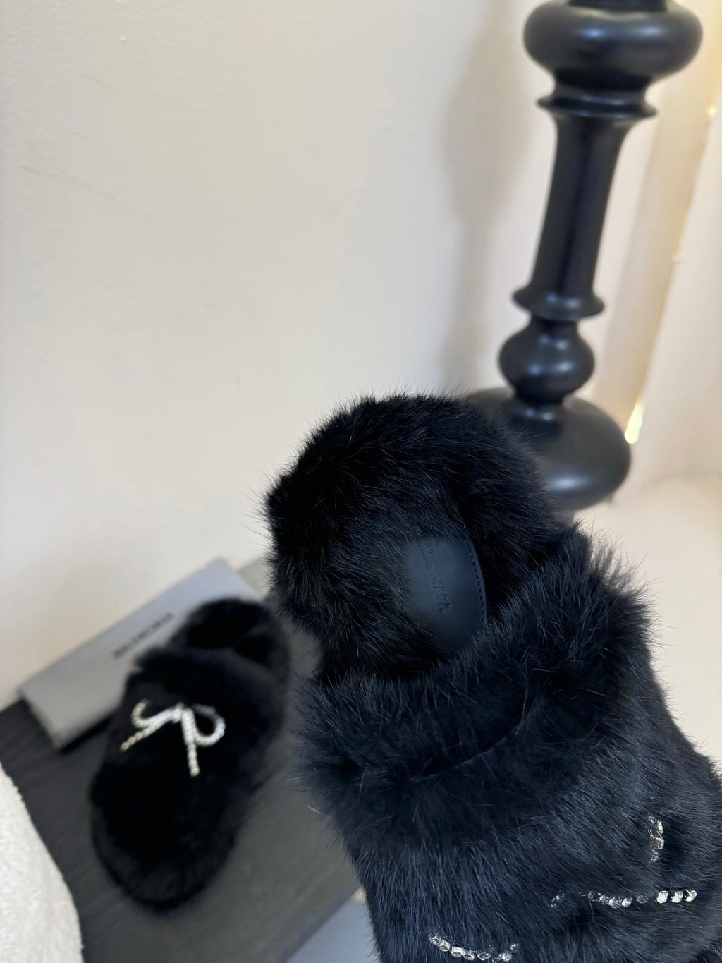 Balenciaga black plush slide sandals with rhinestone bow strap and footbed