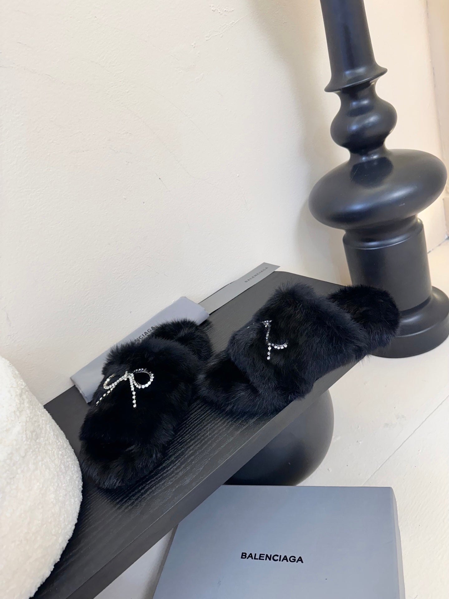 Balenciaga black plush slide sandals, rhinestone bow emblem on top strap