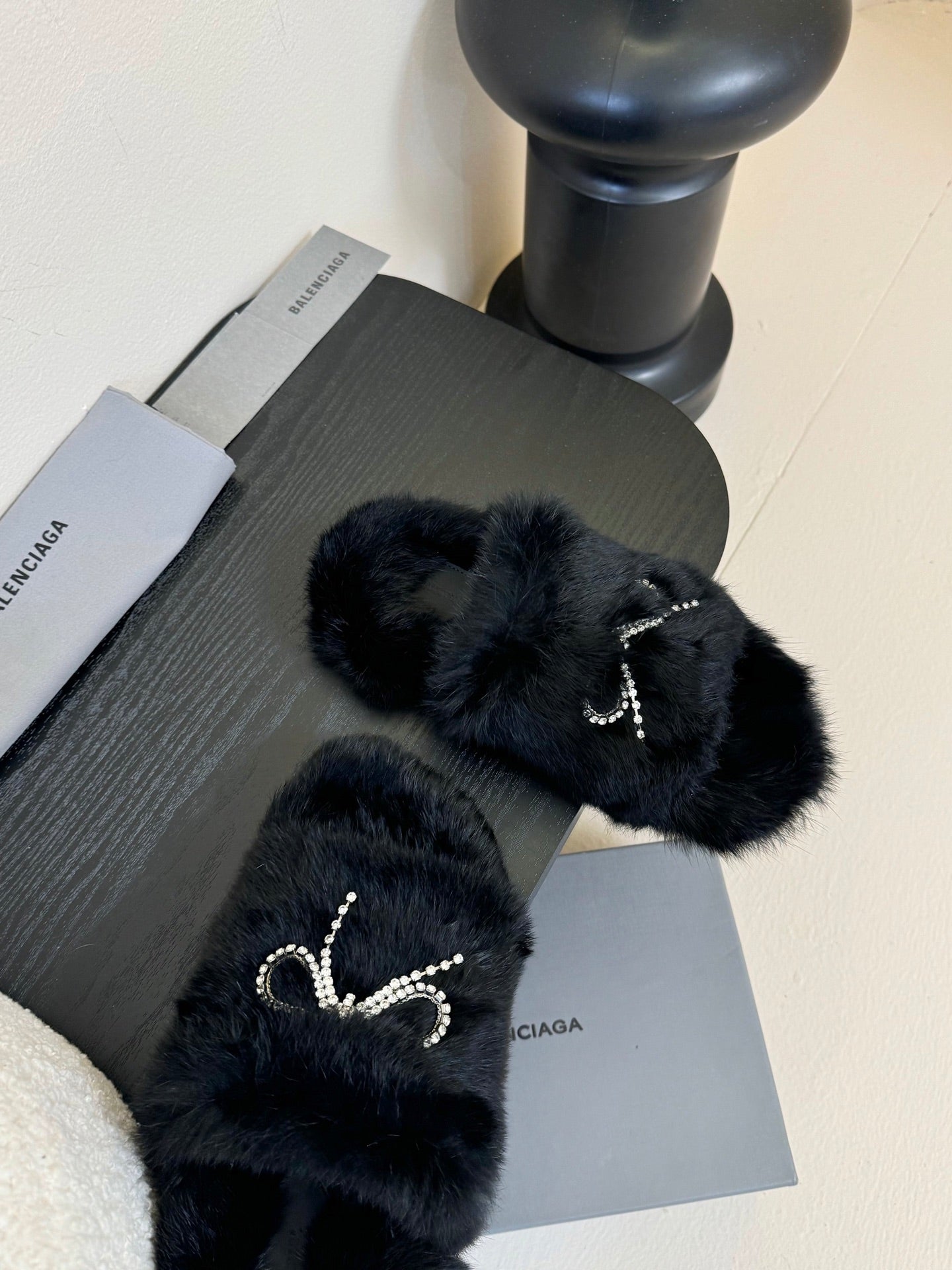 Balenciaga black furry slide sandals with silver-tone bow rhinestone ornament