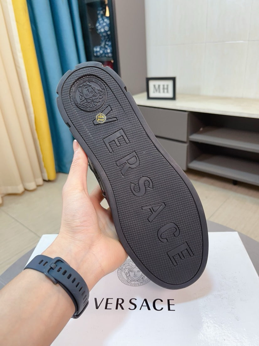 Black Versace sneaker outsole with textured traction tread and embossed lettering