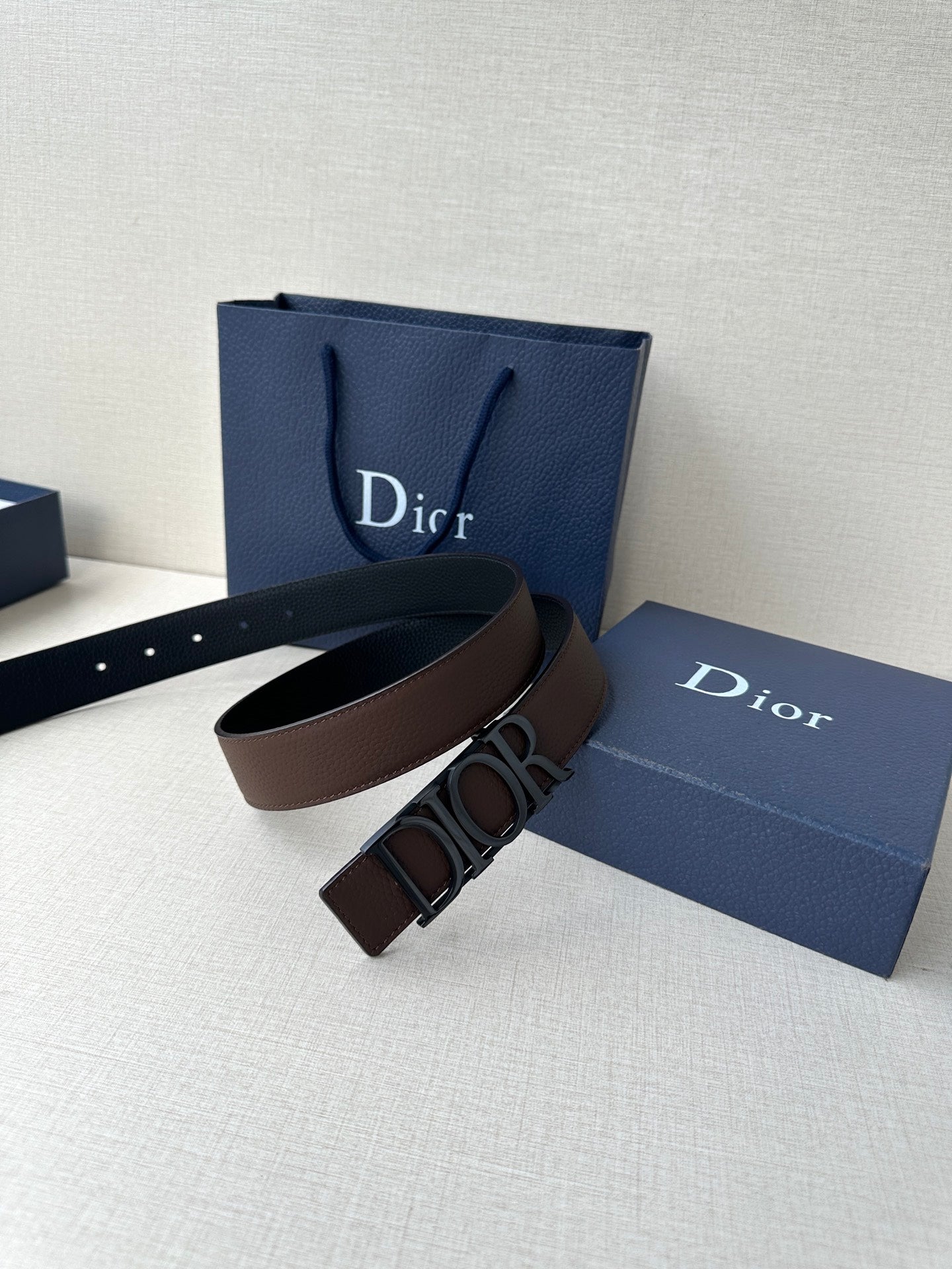 Brown leather belt with rectangular buckle and Dior branding