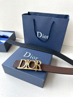 Brown leather belt with dark buckle and gold Dior lettering