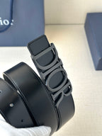 Black leather Dior belt close-up showing Dior buckle and strap keeper