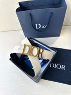 Dior white leather belt with gold-tone Dior logo buckle on adjustable strap
