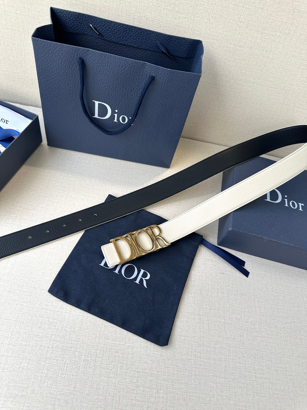 Dior white leather belt with gold-tone Dior buckle and punched adjustment holes