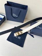 Dior white leather belt with gold-tone Dior buckle and punched adjustment holes