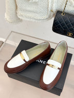 Chanel ladies luxury loafers, brown leather with white vamp strap and gold buckle