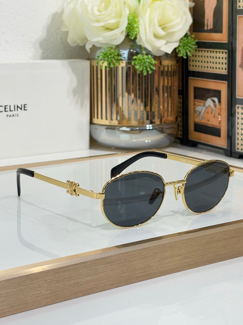 Celine round sunglasses with gold frame and dark blue lenses