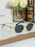 Celine round sunglasses with gold frame and dark blue lenses