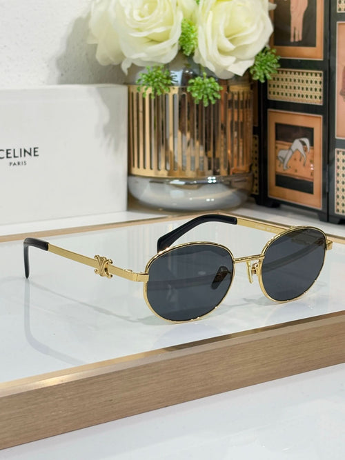 Celine round sunglasses with gold frame and dark blue lenses