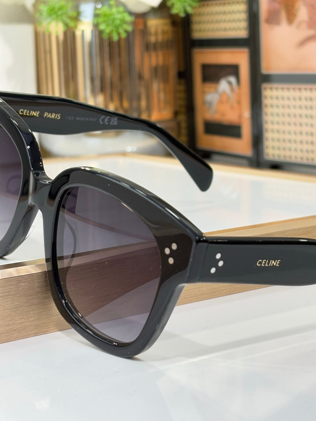 Celine black sunglasses with patterned temple detail