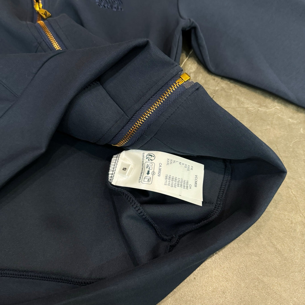 Navy Louis Vuitton hoodie with gold zipper and internal size label on cuff