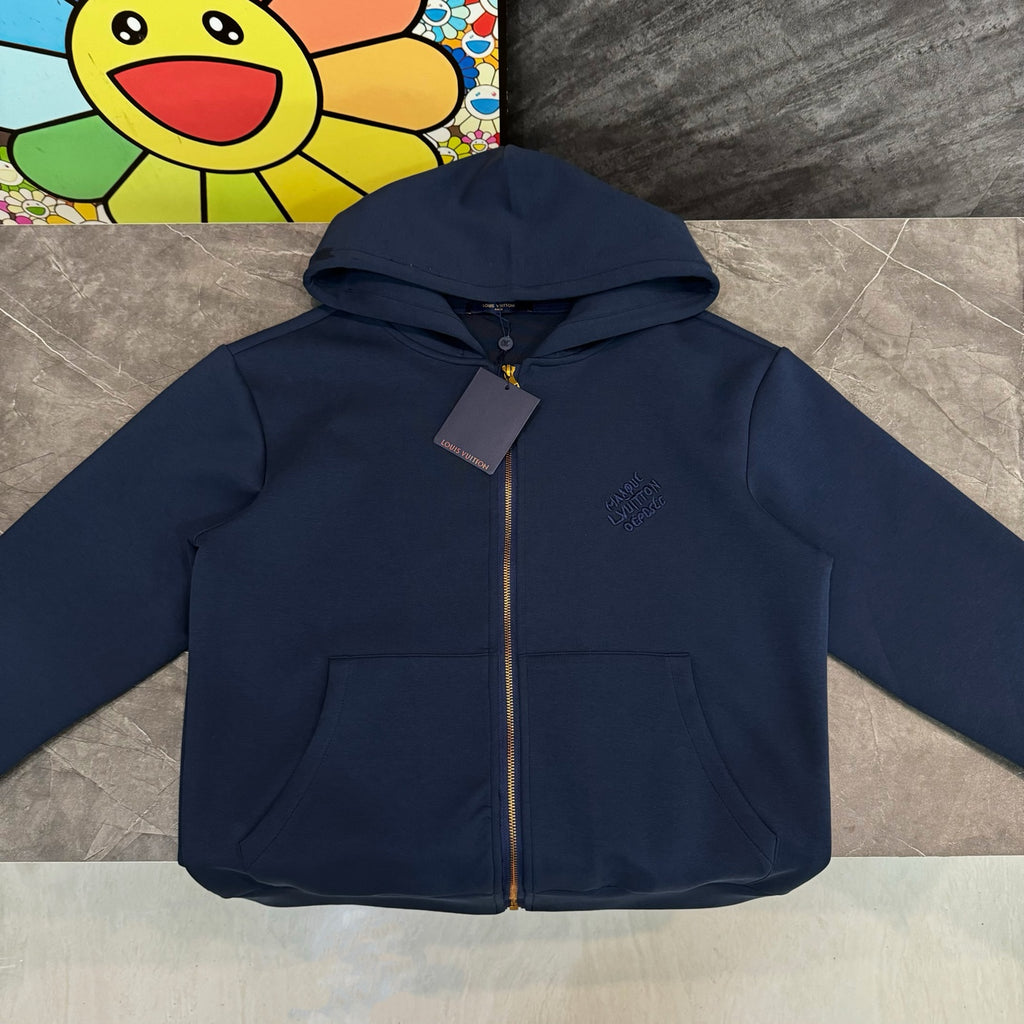 Navy Louis Vuitton zip-up hoodie with hood paired with colorful character pants