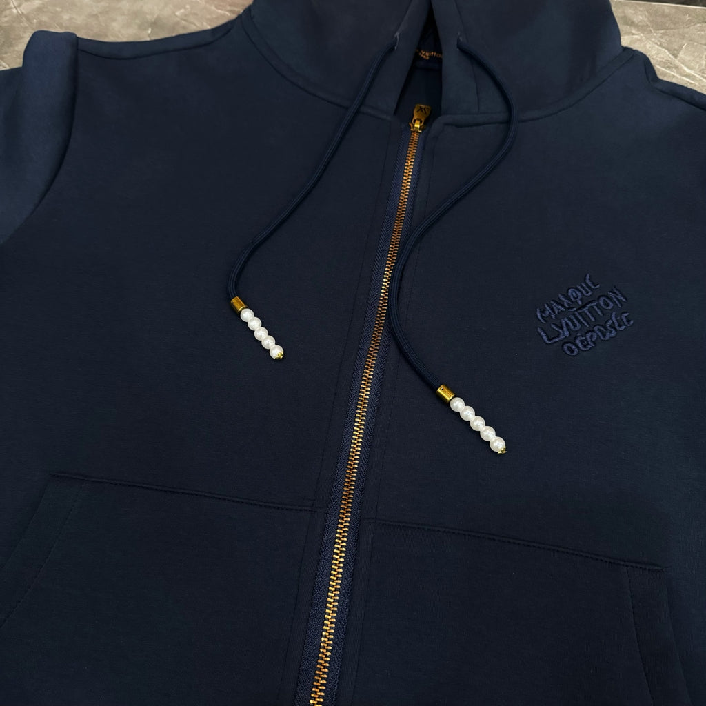 Navy Louis Vuitton zip-up hoodie with hood drawstrings, gold zipper, and chest logo