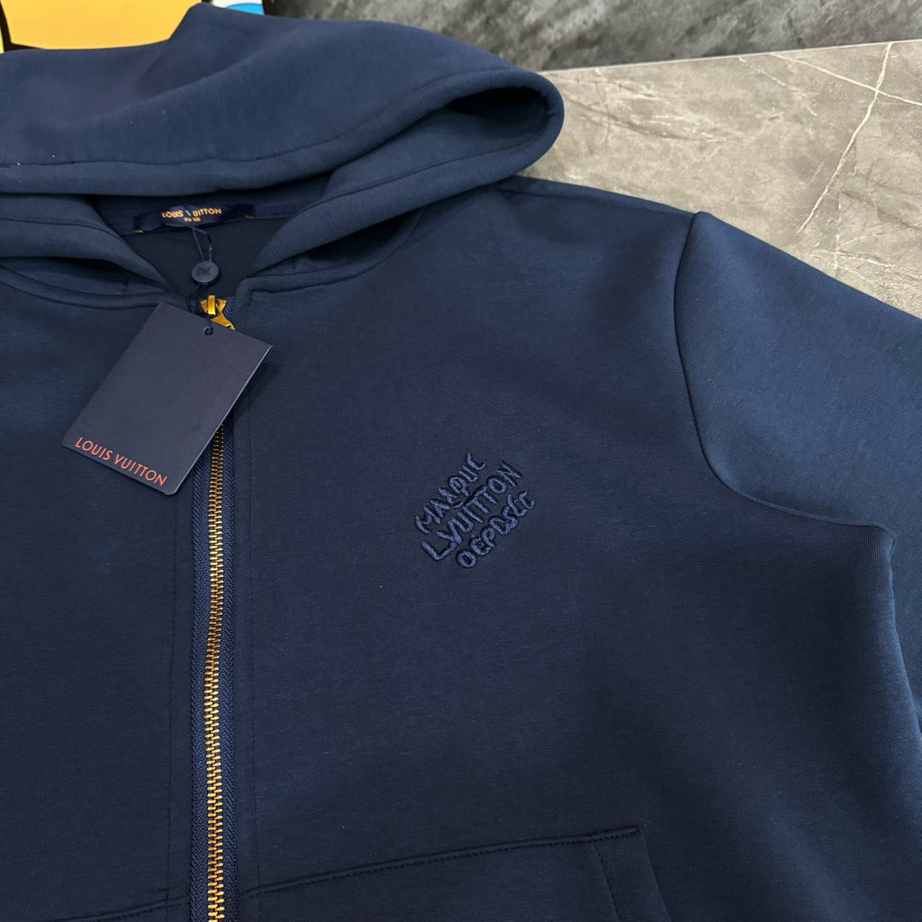 Navy Louis Vuitton zip-up hoodie with hood, small chest logo, and front pocket
