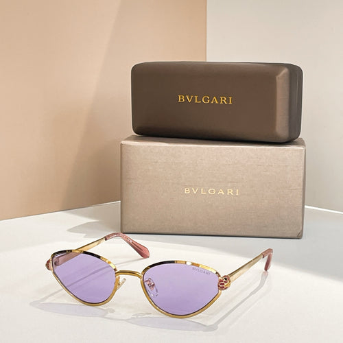 BVLGARI cat-eye sunglasses with gold frame and light purple tinted lenses
