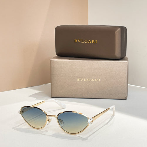 BVLGARI cat-eye sunglasses with gold frame and light blue tinted lenses