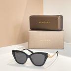 Bvlgari sunglasses with black frame and dark gray tinted lenses
