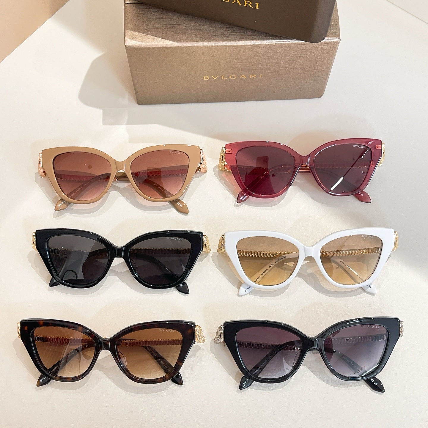 Set of Bvlgari cat-eye sunglasses with mixed frames and tinted lenses