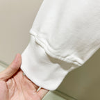 White sweatshirt hem and cuff with ribbed knit trim detail