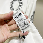 White sweatshirt sleeve with attached size and care label tag