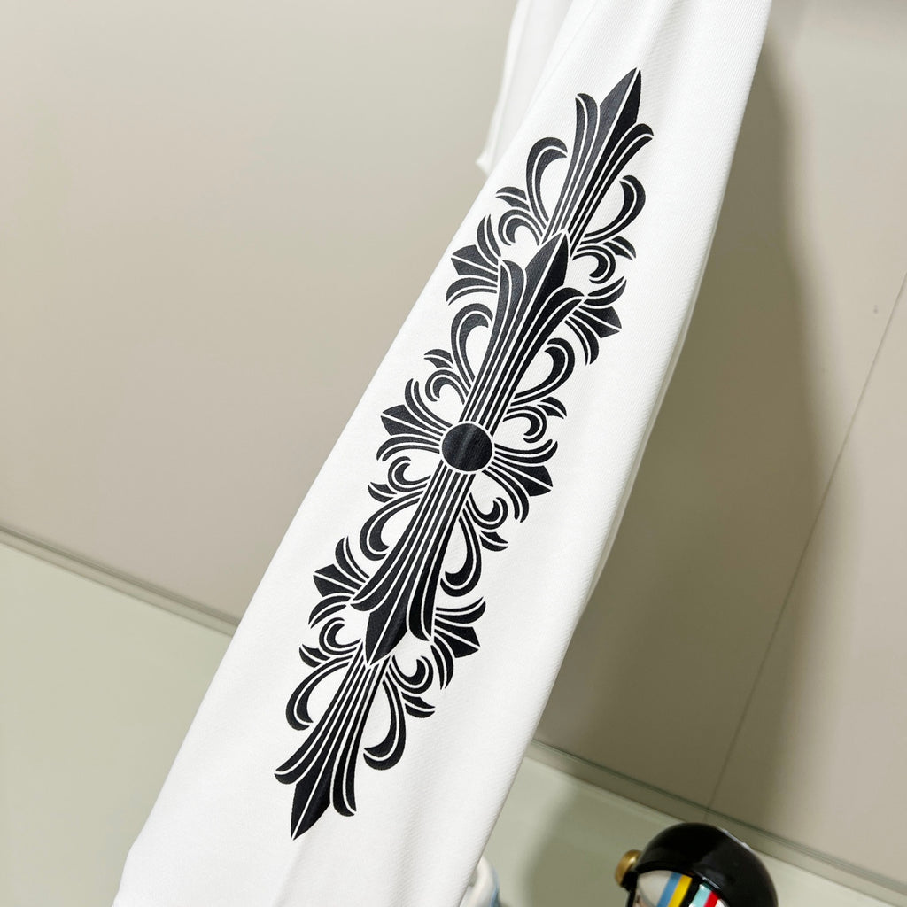 White sweatshirt sleeve with large black decorative floral line art