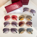 Assorted round sunglasses with tinted lenses in red, purple, brown, and blue frame styles