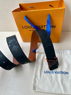Louis Vuitton belt: dark blue monogram leather with square buckle and end strap.